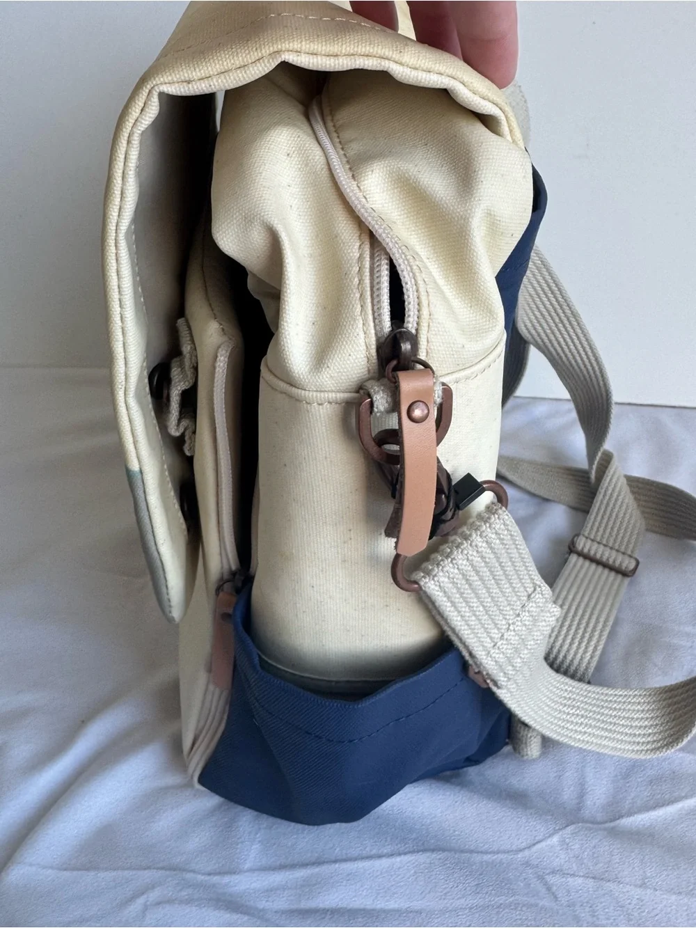 Petunia Pickle Bottom Boxy Backpack Diaper Bag in a geometric cream, navy, teal